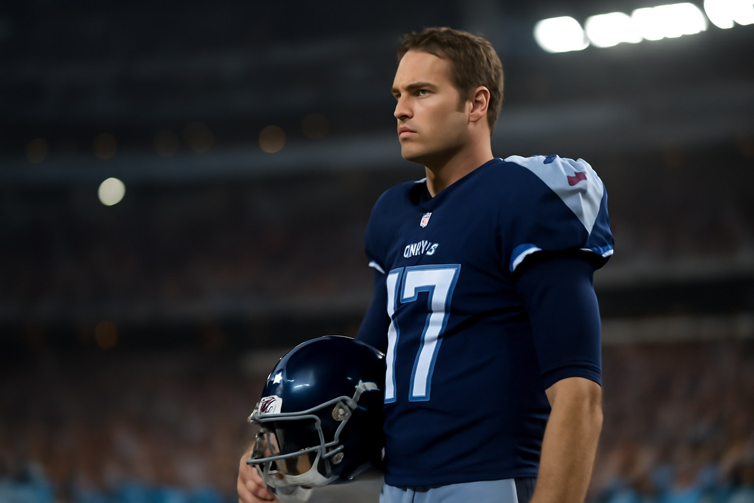 NFL quarterback in a Tennessee Titans uniform looking toward the sideline during a game